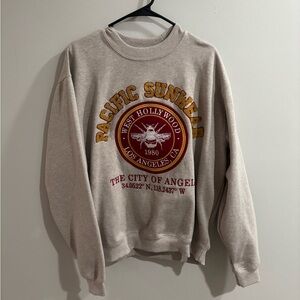 A tan Pacsun men’s crewneck size medium.